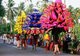 India: A local temple festival procession winds its way through a small village on its way to a temple, Kozhikode (Calicut) District, northern Kerala